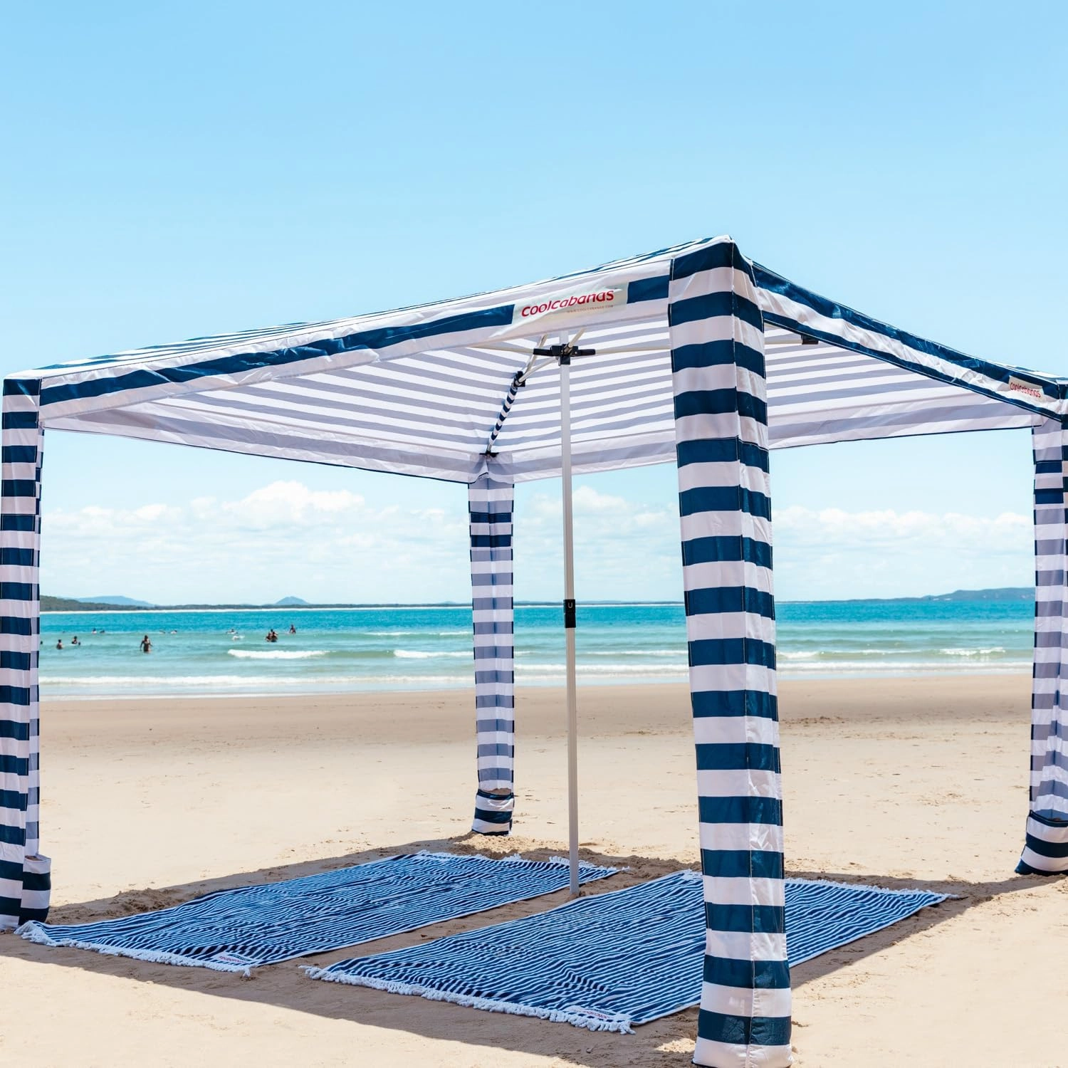 CoolCabana Beach Shade Tent - Easy Setup, UPF 50  Protection, Large & Medium Sizes, Compact & Wind Resistant - Beach Cabana for The Whole Family - Navy Stripes, Large